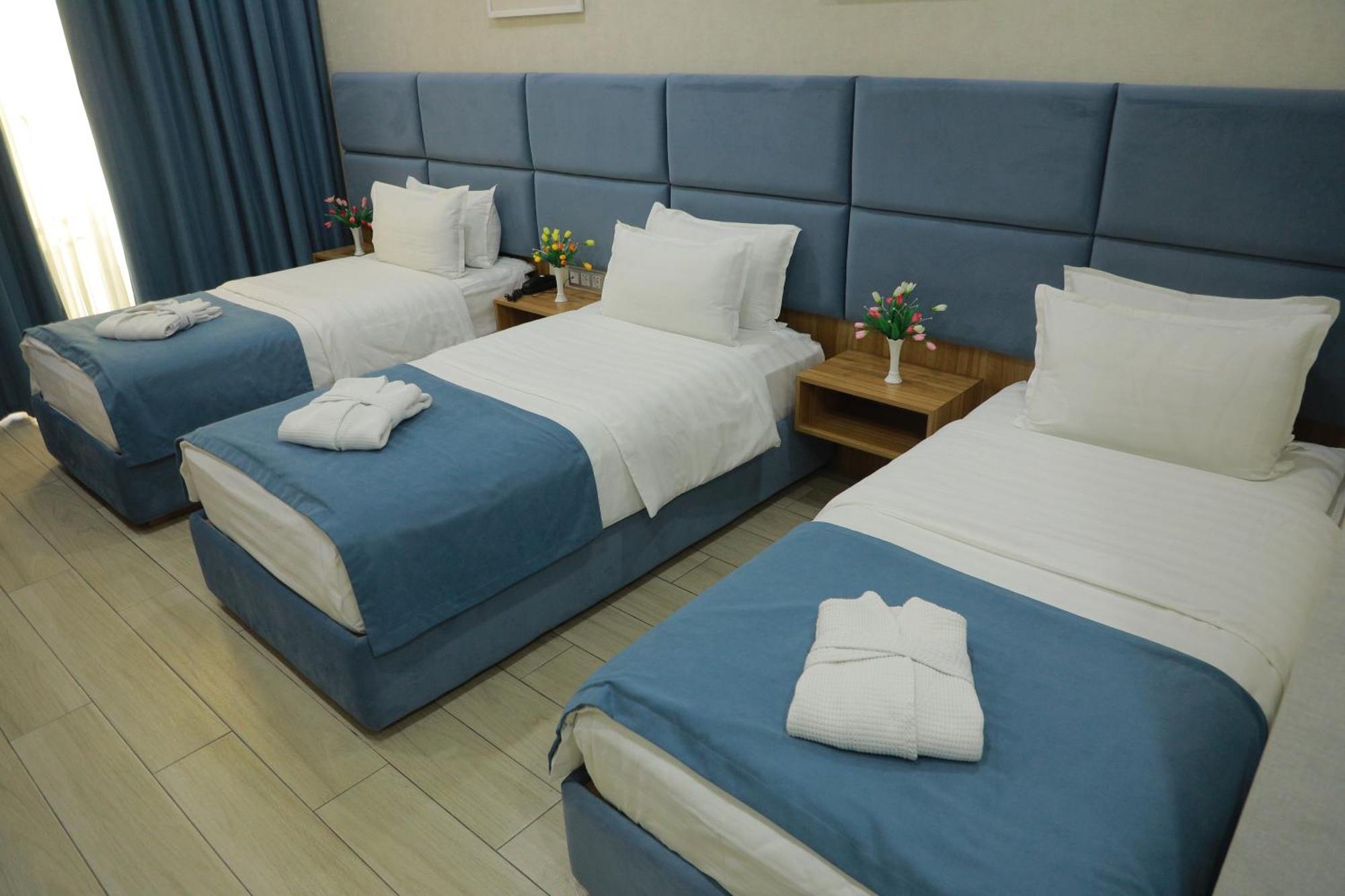 Human Hotel Tashkent Bagian luar foto