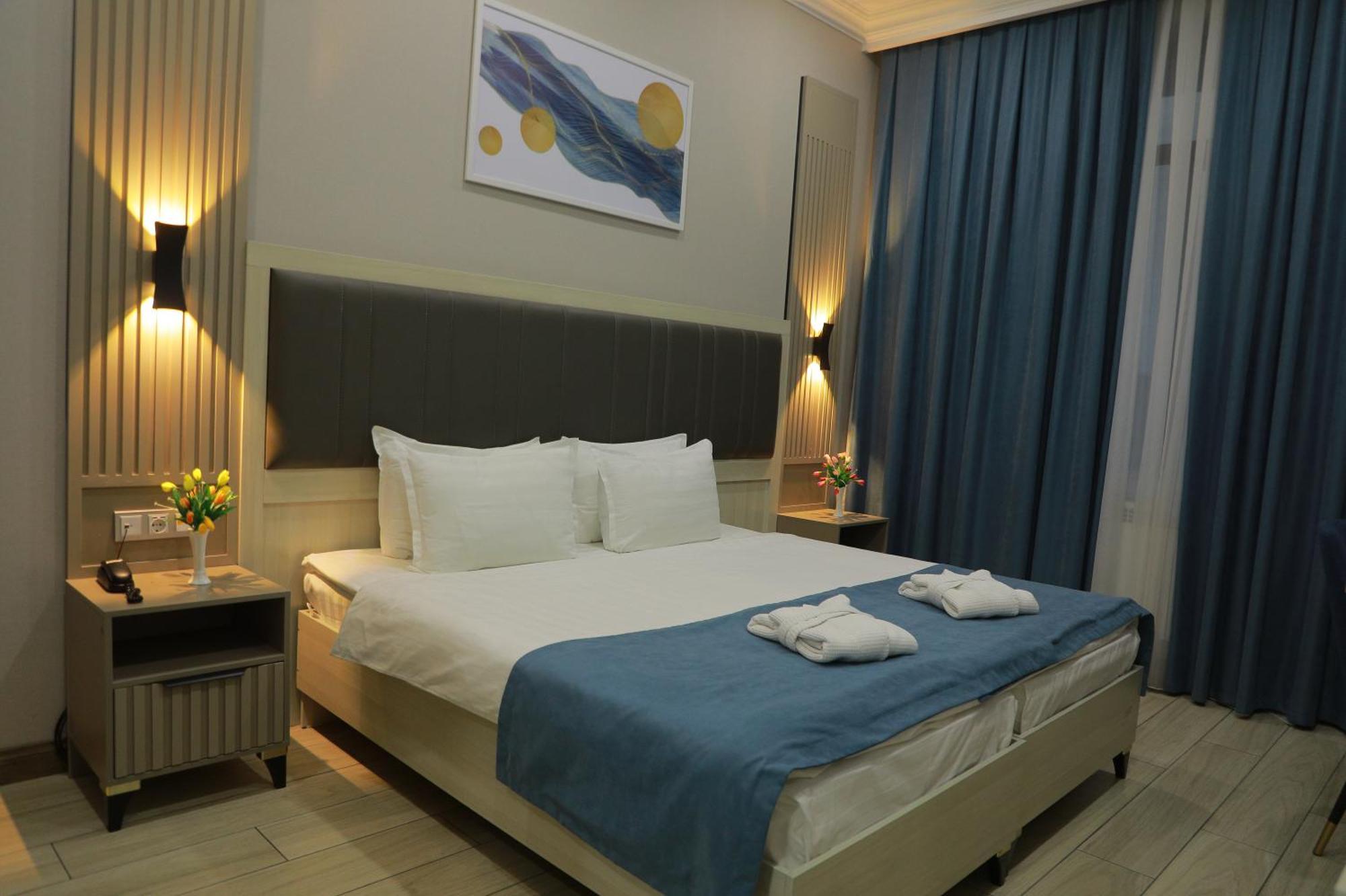 Human Hotel Tashkent Bagian luar foto