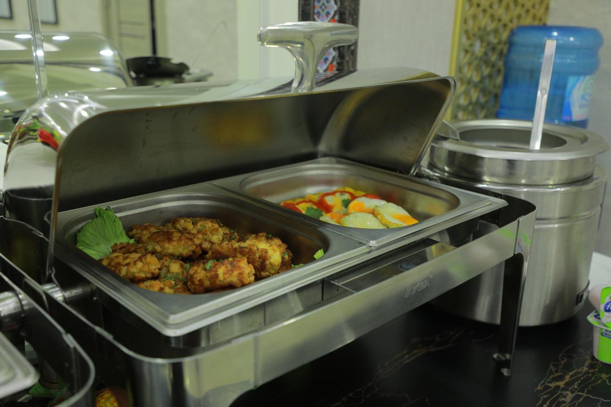 Human Hotel Tashkent Bagian luar foto